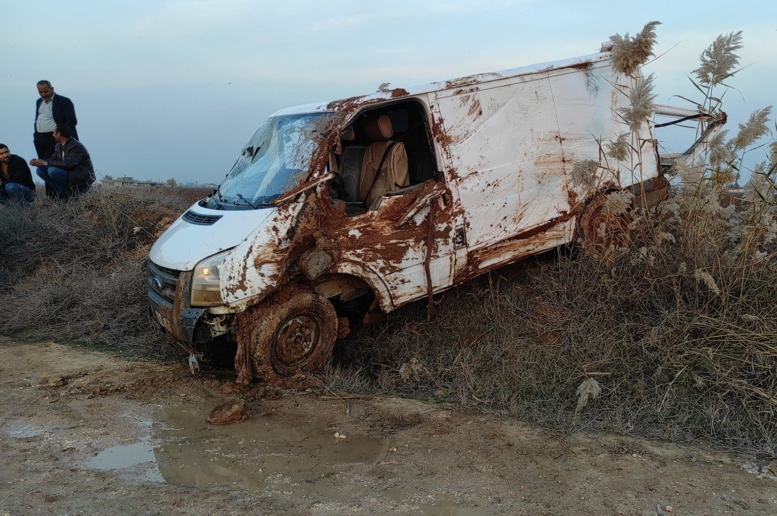 Wreckage of the van carrying migrants, in Şanlıurfa, southeastern Türkiye, Dec. 16, 2022. (İHA Photo)