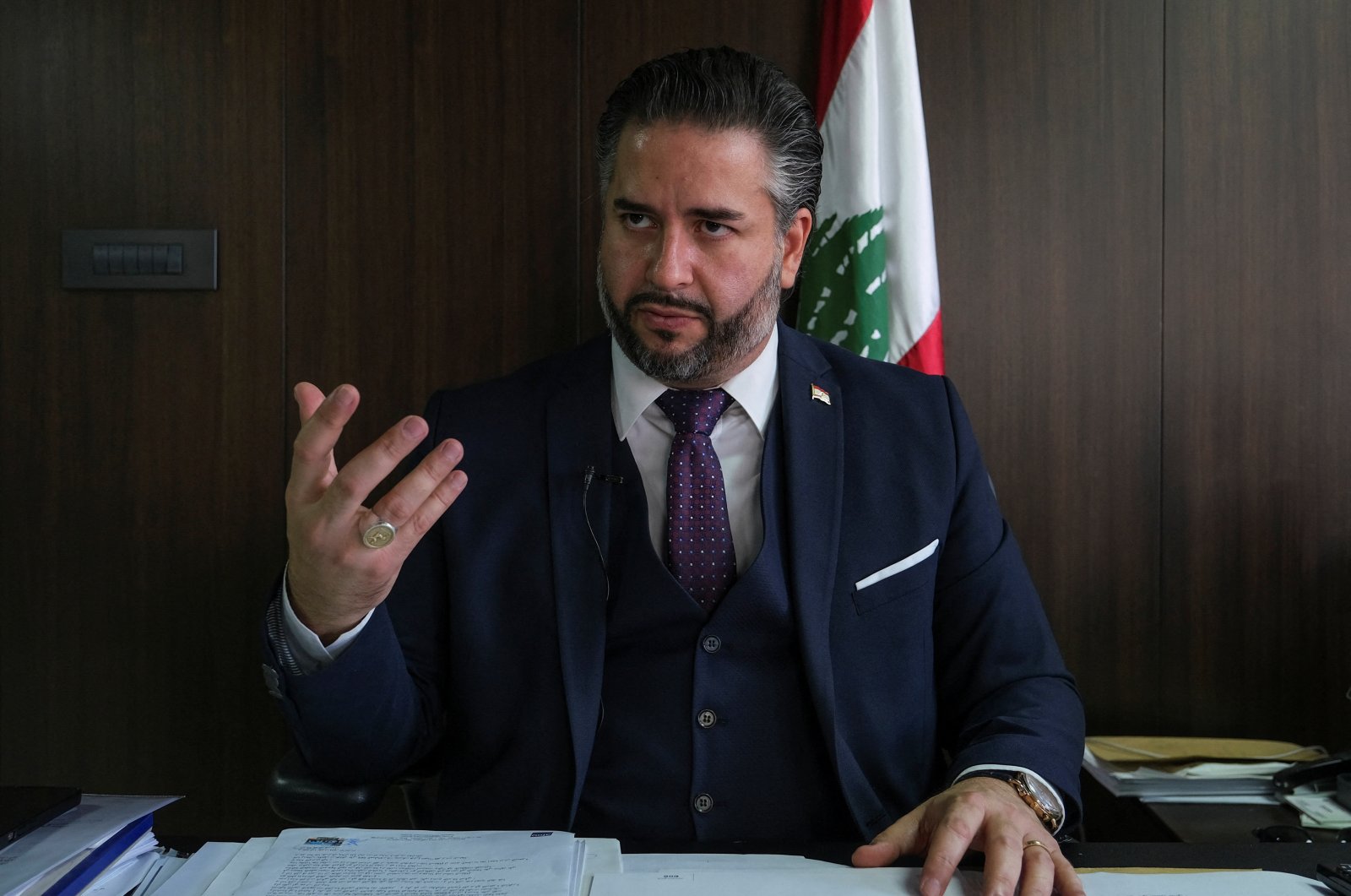 Caretaker Economy Minister Amin Salam gestures during an interview with Reuters in Beirut, Lebanon, Dec. 9, 2022. (Reuters Photo)