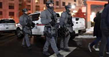 York Regional Police tactical officers work the scene of a fatal shooting in Vaughan, Ontario, Dec. 18, 2022. (AP Photo)