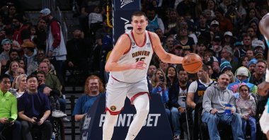 Denver Nuggets' Nikola Jokic dribbles the ball during the game against the Charlotte Hornets at the Ball Arena, Denver, Colorado, U.S., Dec. 18, 2022. (Getty Images Photo)