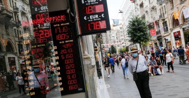 A man walks past a currency exchange office in Istanbul, Türkiye, June 10, 2022. (Reuters Photo)