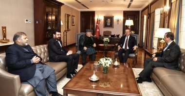 Foreign Minister Mevlüt Çavuşoğlu hosts Hamid Karzai in Ankara, Dec. 19, 2022. (AA Photo)