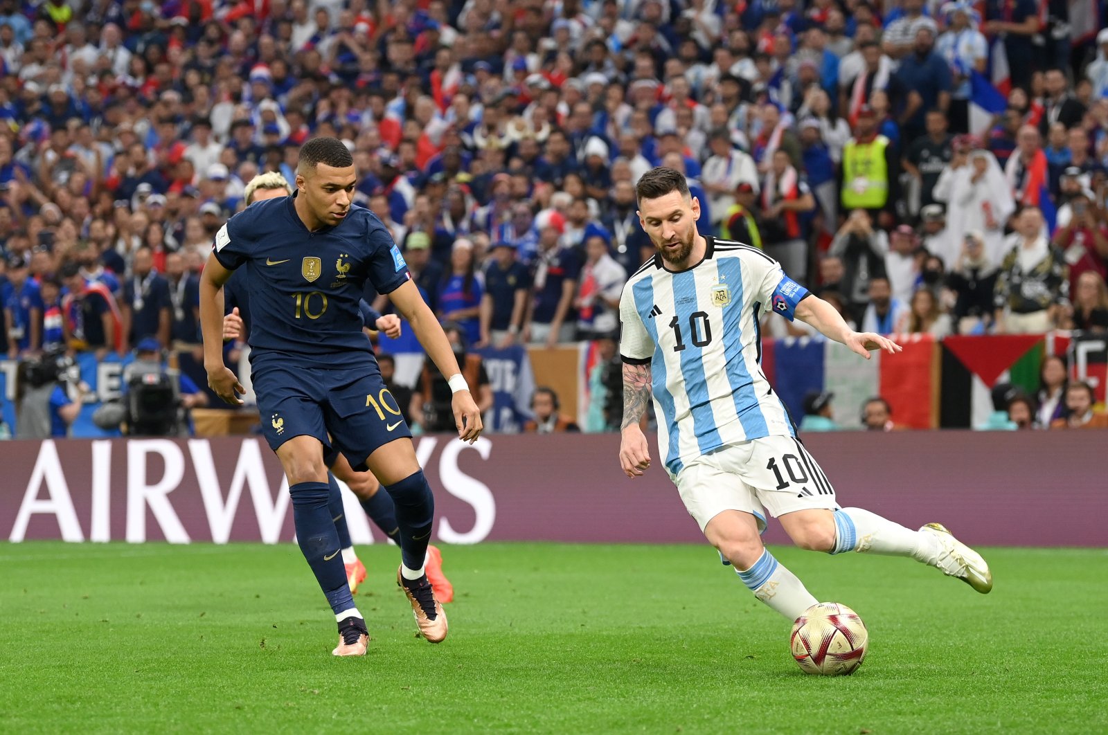 Argentina&#039;s Lionel Messi controls the ball against France&#039;s Kylian Mbappe during the FIFA World Cup Qatar 2022 final match between Argentina and France at Lusail Stadium, Lusail City, Qatar, Dec. 18, 2022. (Getty Images Photo)