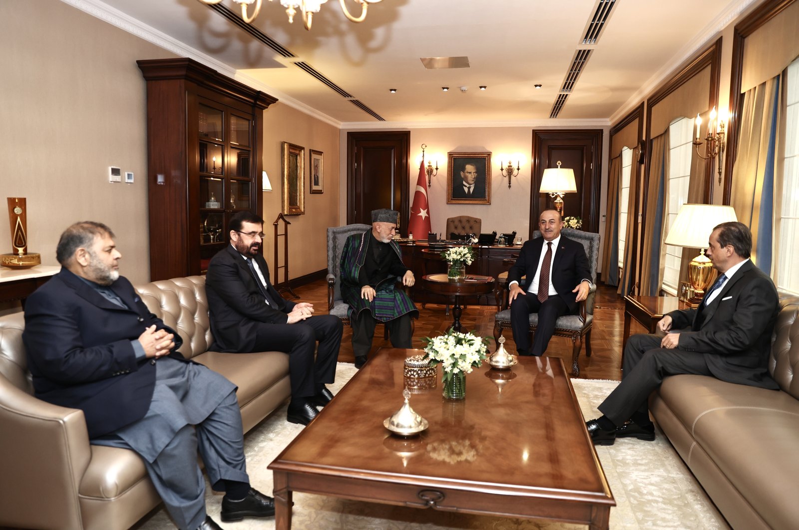Foreign Minister Mevlüt Çavuşoğlu hosts Hamid Karzai in Ankara, Dec. 19, 2022. (AA Photo)