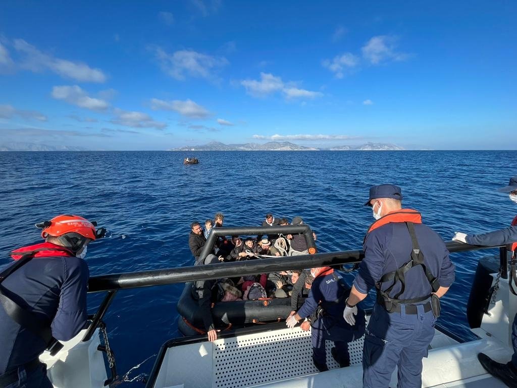 The Turkish coast guard rescues 88 irregular migrants pushed back by Greece into Turkish territorial waters in the Aegean Sea near Türkiye&#039;s Muğla province, Dec. 19, 2022. (AA Photo)