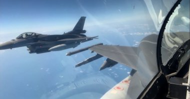 A handout photo from Türkiye's National Defense Ministry shows a Turkish F-16 jet conducting an air mission, Nov. 30, 2022. (DHA Photo)