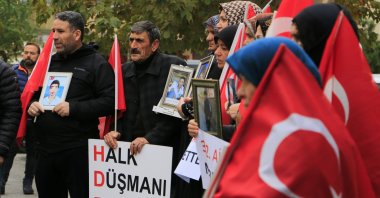 Kurdish families, whose children were abducted by the PKK, protest against the terrorist group and the pro-PKK Peoples' Democratic Party (HDP) in front of the party's office in southeastern Diyarbakır province, Türkiye, Dec. 14, 2022. (IHA Photo)