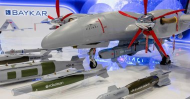 A Bayraktar Akıncı UCAV and ammunitions on display at the SAHA Expo Defense and Aerospace Fair in Istanbul, Türkiye, Oct. 27, 2022. (Reuters Photo)