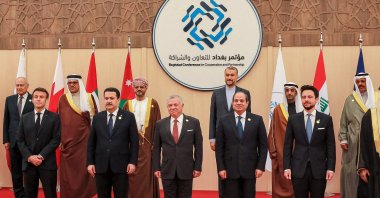 (Front L to R) French President Emmanuel Macron, Iraq&#039;s Prime Minister Mohamed Shia al-Sudani, Jordan&#039;s King Abdullah, Egypt&#039;s President Abdel Fattah el-Sissi, and Jordan&#039;s Crown Prince Hussein; along with Iranian Foreign Minister Hossein Amir-Abdollahian (4th-L behind) and other dignitaries pose together in a family photo at the start of the &quot;Baghdad Conference for Cooperation and Partnership&quot; in Sweimeh, Jordan, Dec. 20, 2022. (AFP Photo)