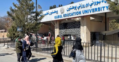 Female students walk in front of the Kabul Education University in Kabul, Afghanistan, Feb. 26, 2022. (Reuters File Photo)