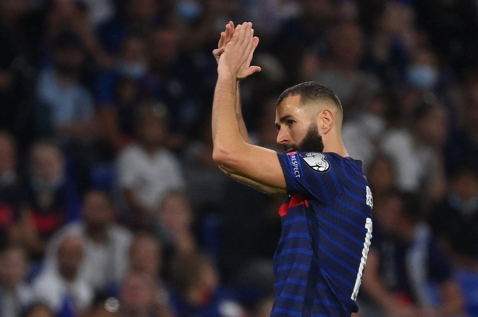 France&#039;s forward Karim Benzema applauds during the FIFA World Cup Qatar 2022 Group D qualification football match between France and Finland at the Groupama stadium in Decines-Charpieu, Lyon, France, Sept. 7, 2021. (AFP Photo)