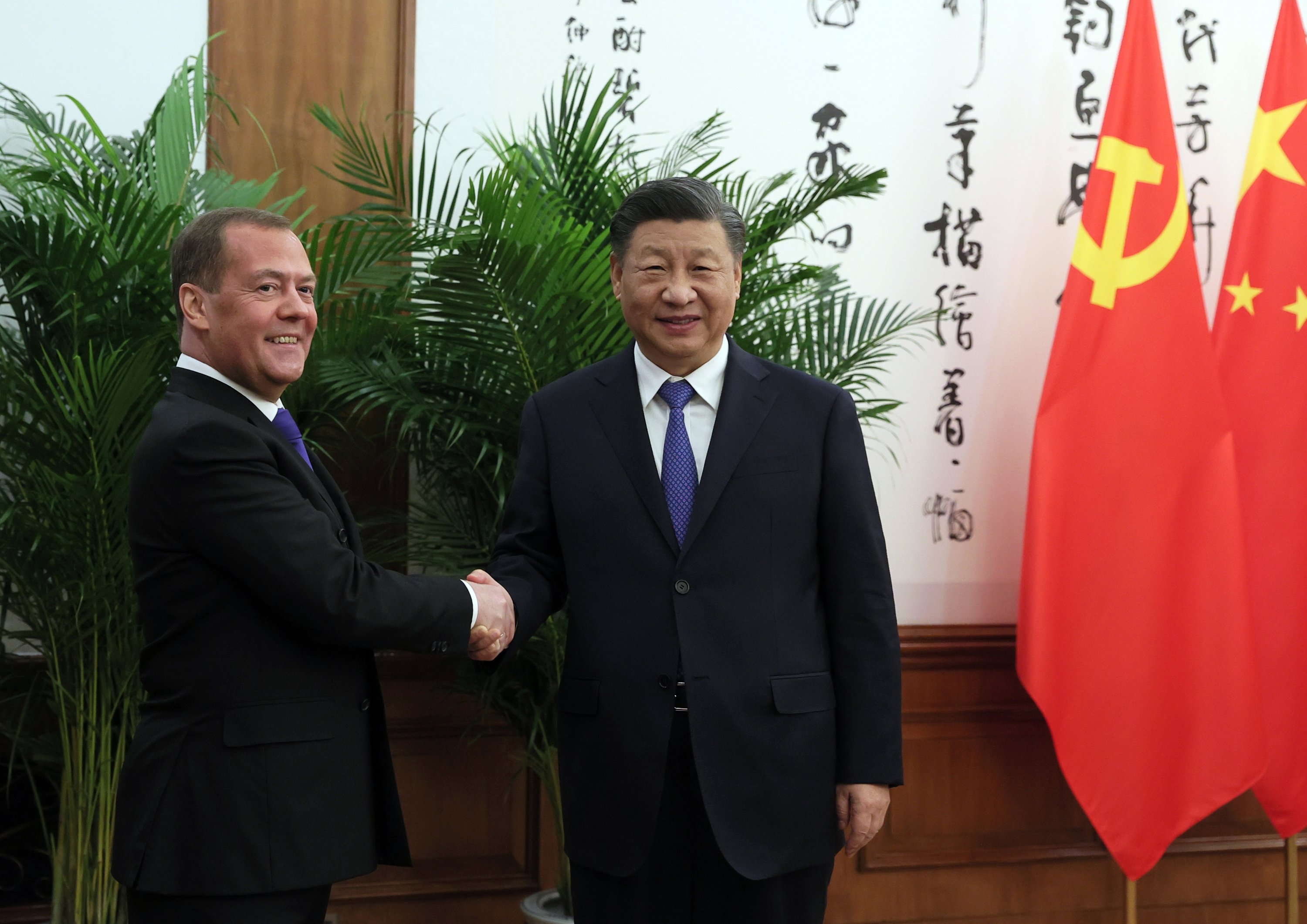 Russia's Medvedev meets China's Xi during surprise Beijing visit ...