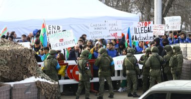 Azerbaijani ecologists and nongovernmental organizations protest the alleged "illegal exploitation" of mines in the Karabakh region where Armenians live and Russian peacekeepers are stationed, Azerbaijan, Dec. 13, 2022. (AA Photo)