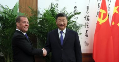 Deputy head of Russia&#039;s Security Council Dmitry Medvedev (L) and Chinese President Xi Jinping shake hands during their meeting in Beijing, China, Dec. 21, 2022. (EPA Photo)