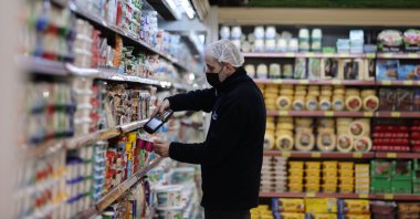 A worker is seen at a market in Istanbul, Türkiye, Feb. 14, 2022. (AA Photo)