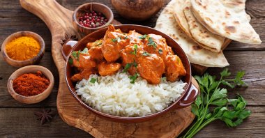 Chicken tikka masala dish with rice and naan bread in an undated photo. (Shutterstock File Photo)