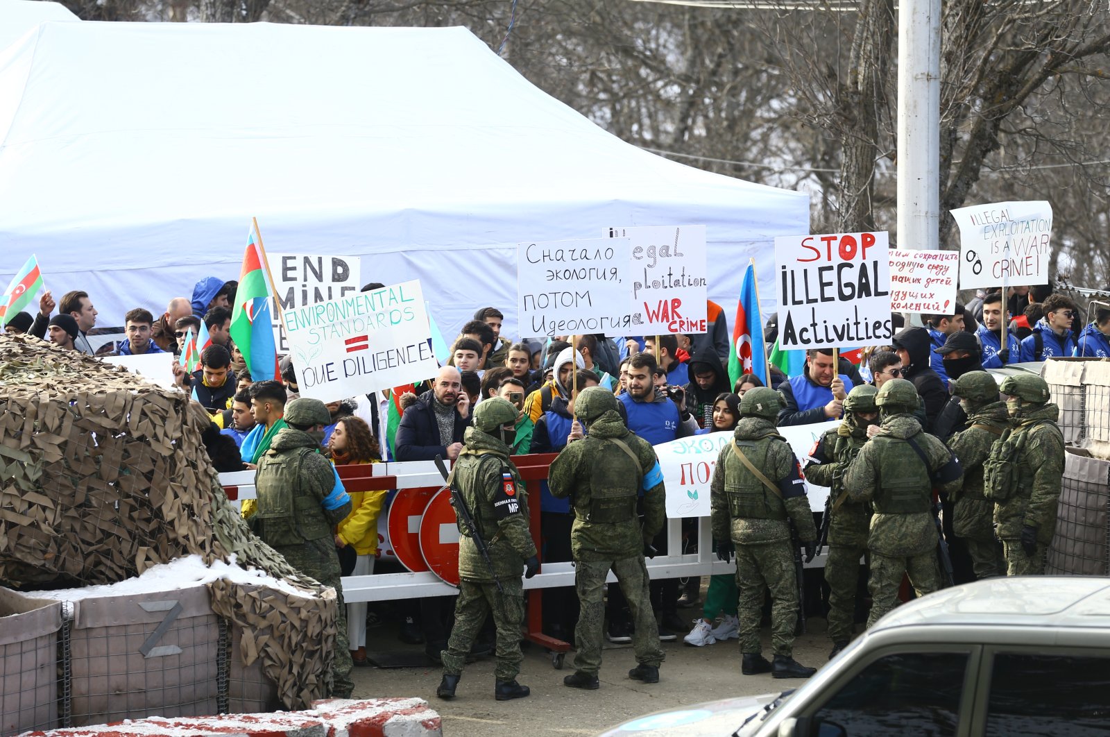Azerbaijani ecologists and nongovernmental organizations protest the alleged &quot;illegal exploitation&quot; of mines in the Karabakh region where Armenians live and Russian peacekeepers are stationed, Azerbaijan, Dec. 13, 2022. (AA Photo)