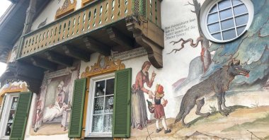 A beautiful house with a depiction of a fairy tale in Oberammergau, Germany. (Photo by Özge Şengelen)