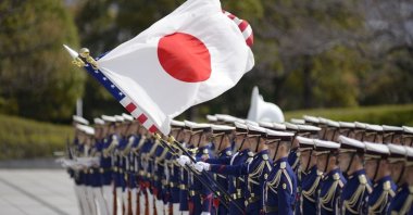 U.S. and Japan national flags futter in the wind as U.S. Secretary of Defense Lloyd Austin and Japanese Defense Minister Kishi Nobuo attends a review an honor guard prior the U.S.-Japan Defense Ministers Bilateral meeting at the Japan Ministry of Defense, March 16, 2021, in Tokyo, Japan. (ReutersPhoto)