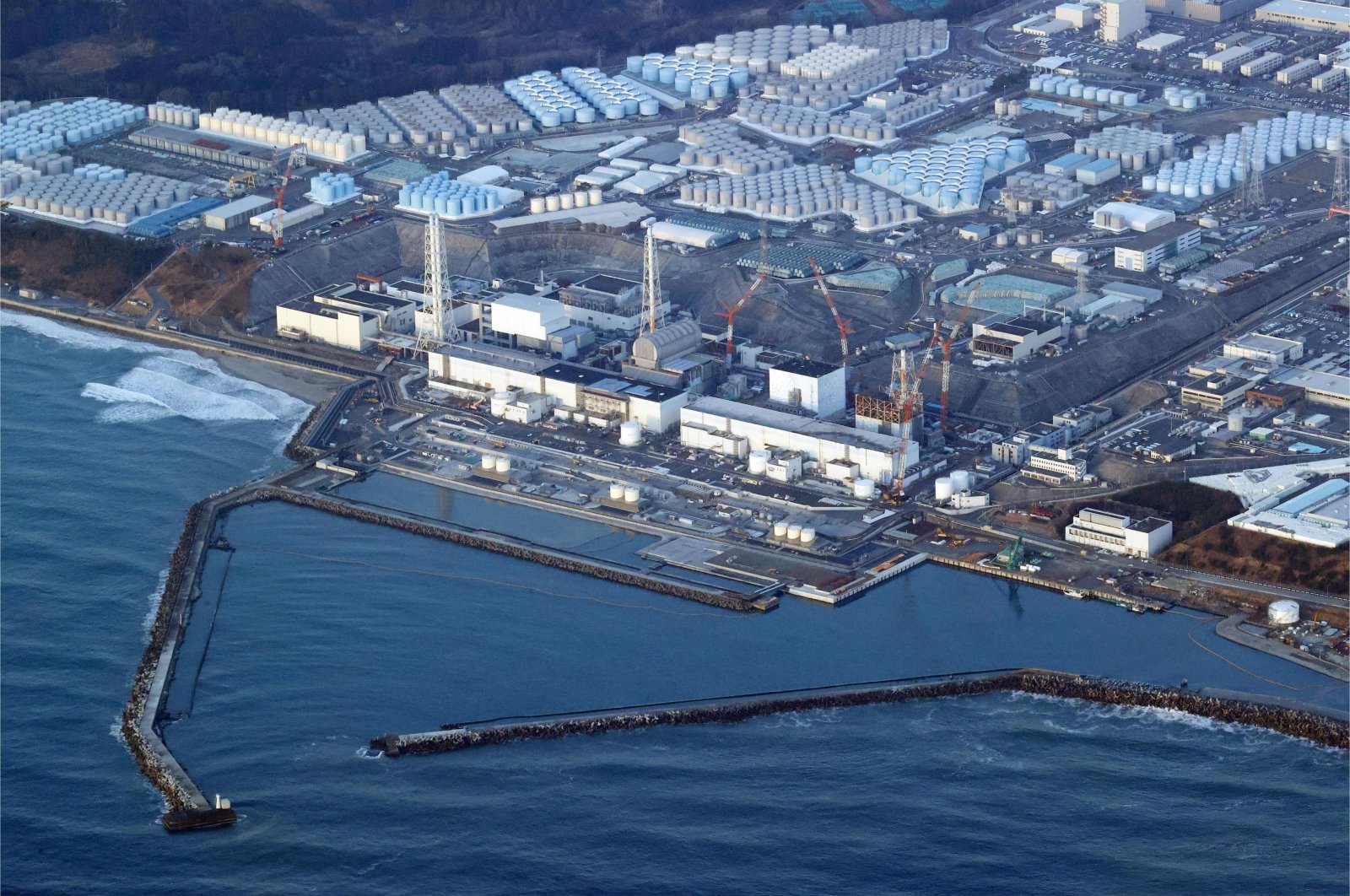 An aerial photo of the Fukushima Daiichi nuclear power plant in Okuma town, Fukushima prefecture, north of Tokyo, Japan, March 17, 2022. (AP Photo)
