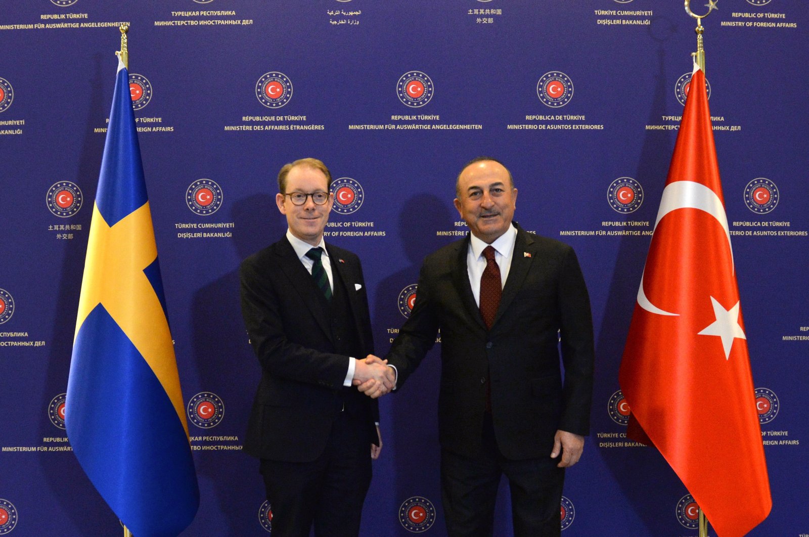 Foreign Minister Mevlüt Çavuşoğlu (R) and Swedish Foreign Minister Tobias Billström (L) shake hands before their meeting in Ankara, Türkiye, Dec. 22, 2022. (EPA Photo)