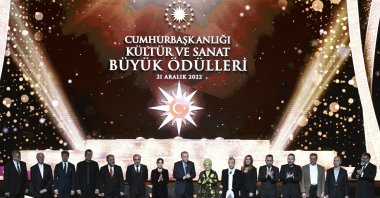 The artists, President Recep Tayyip Erdoğan (center L) and first lady Emine Erdoğan (center R) attend the 2022 Presidential Culture and Art Grand Awards Ceremony, Ankara, Türkiye, Dec. 21, 2022. (AA Photo)