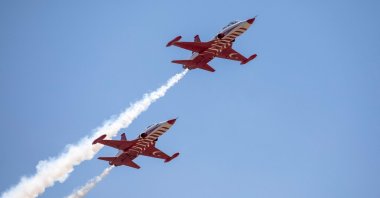In this file photo, Turkish F5 fighter jets fly during an official ceremony commemorating Türkiye's Peace Operation in Northern Cyprus and the establishment of the Turkish Republic of North Cyprus (TRNC), in Lefkoşa (Nicosia), TRNC, July 20, 2022. (AFP Photo)