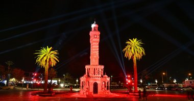 A visual presentation reflected on the historical Clock Tower and the Izmir Governor's Office for the New Century Izmir Economy to be held on February 2023, Dec. 21, 2022. (AA Photo)