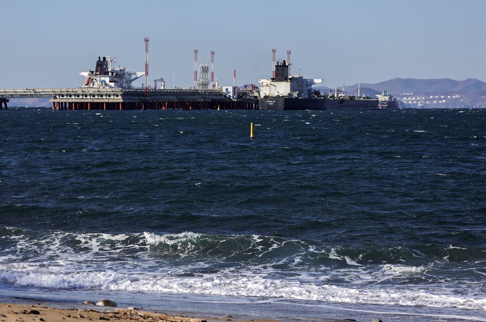 Vessels, including the Shun Tai crude oil tanker, are seen anchored at the terminal Kozmino in Nakhodka Bay near the port city of Nakhodka, Russia, Dec. 4, 2022. (Reuters Photo)