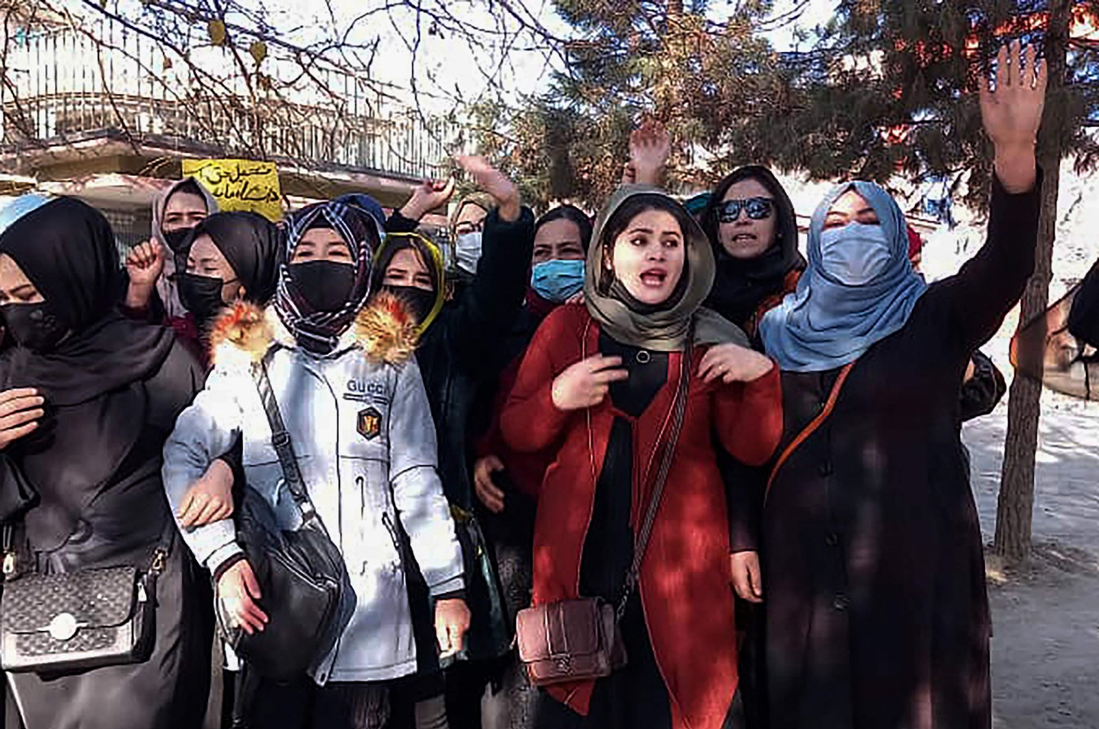 Afghan women chant slogans to protest against the ban on university education for women, in Kabul, Afghanistan, Dec. 22, 2022. (AFP Photo)