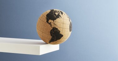 Considering the international credible researches, we see five main risks that will pose a threat to the world in the upcoming year. (Getty Images Photo)