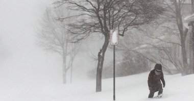 A person navigates deep snow during a winter storm in Buffalo, New York, U.S., Dec. 24, 2022. (EPA Photo)