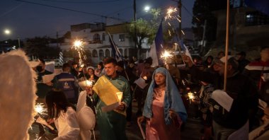 A group of Central American migrants takes part in a posada celebration by the Casa del Migrante in the city of Saltillo, Coahuila state, Mexico, Dec. 20, 2022. (EPA Photo)