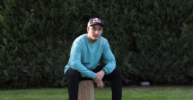 National motorcyclist Can Öncü poses for a photo, Antalya, Türkiye, Dec. 25, 2022. (AA Photo)