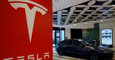 A Tesla model 3 car is seen in their showroom in Singapore, Oct. 22, 2021. (Reuters Photo)