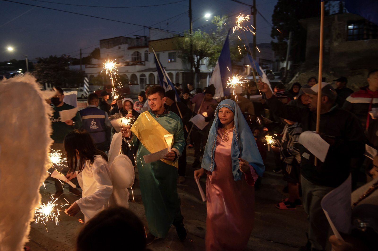 A group of Central American migrants takes part in a posada celebration by the Casa del Migrante in the city of Saltillo, Coahuila state, Mexico, Dec. 20, 2022. (EPA Photo)