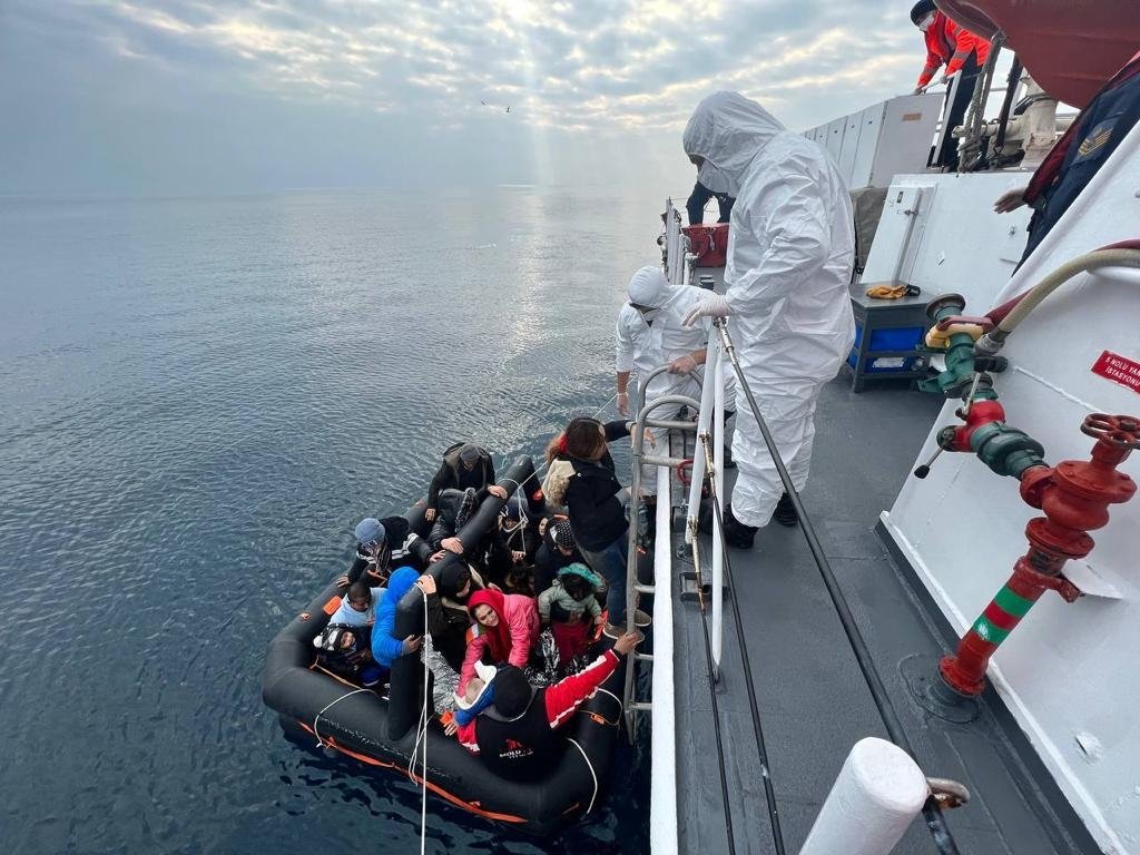 Turkish coast guard rescue irregular migrants pushed back by Greek coast guard off Izmir province, Dec. 26, 2022. (AA Photo)