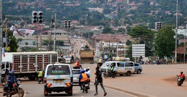 Motorists and cyclists are seen at a traffic light intersection amid the Ebola outbreak in Kampala, Uganda, Nov. 16, 2022. (Reuters Photo)
