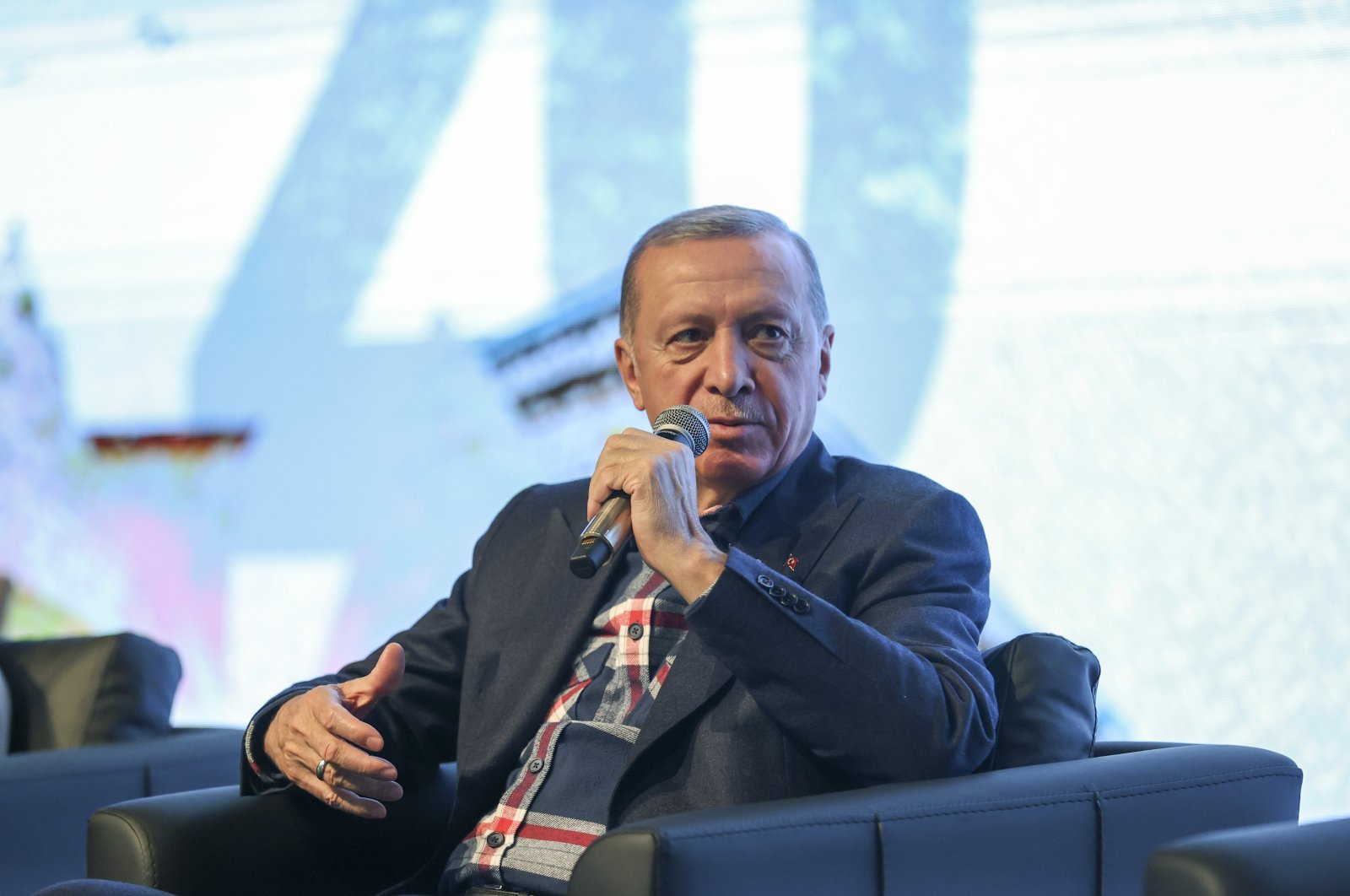 President Recep Tayyip Erdoğan speaks at an event with youths in Türkiye&#039;s eastern Erzurum province, Dec. 25, 2022. (IHA Photo)