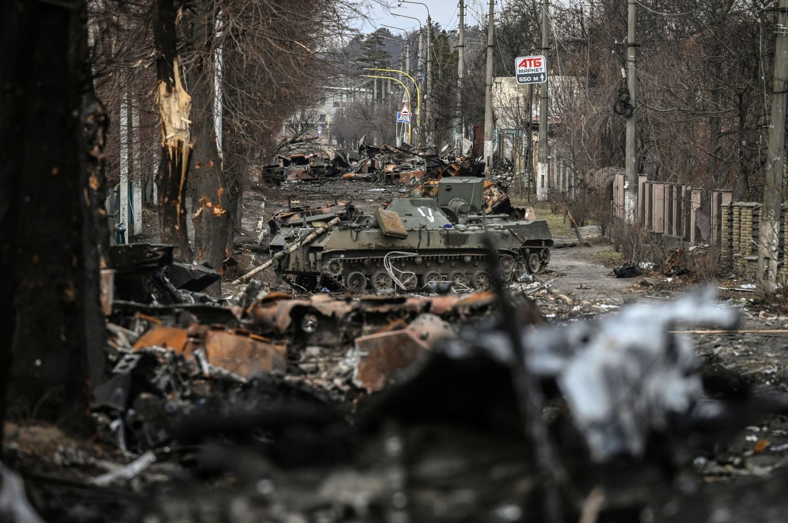Destroyed Russian armored vehicles line the street in the city of Bucha, west of Kyiv, on March 4, 2022. (AFP File Photo)