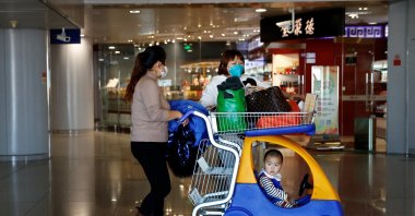 Travelers wait for their flight at Beijing Capital International Airport, Beijing, China, Dec. 27, 2022. (Reuters Photo)