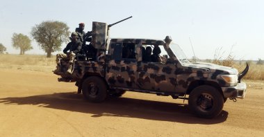 Nigerian soldiers patrol in Kankara, Nigeria, Dec. 16, 2020. (AP Photo)