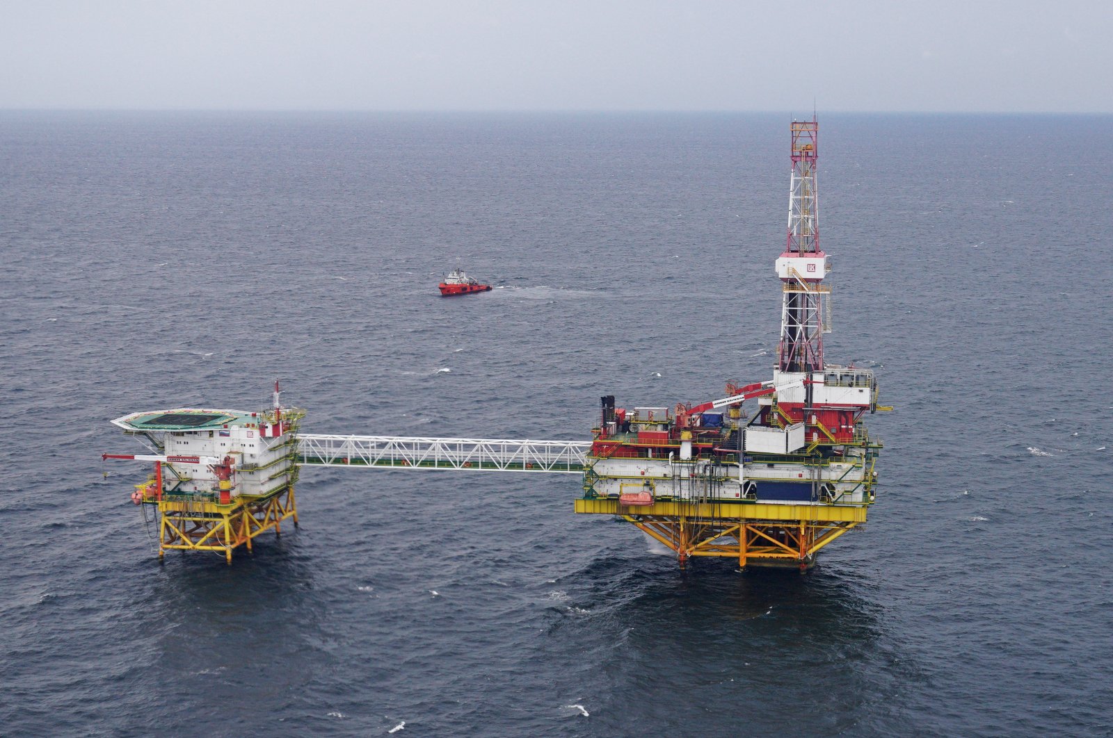 An oil platform operated by Lukoil company is pictured from a helicopter carrying members of a local election committee and journalists during the early voting for the parliamentary election, at the Kravtsovskoye oilfield in the Baltic Sea, Russia, Sept. 16, 2021. (Reuters Photo)