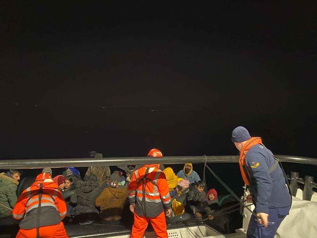 Turkish coast guard teams rescue 32 irregular migrants pushed back by Greece off the coast of Ayvacık district in Türkiye&#039;s western Çanakkale province, Dec. 27, 2022. (AA Photo)
