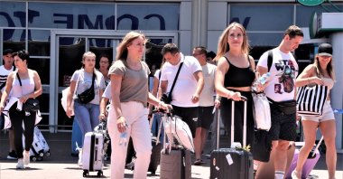 Russian tourists are seen exiting an airport in Antalya, southern Türkiye, Aug. 11, 2022. (IHA Photo)