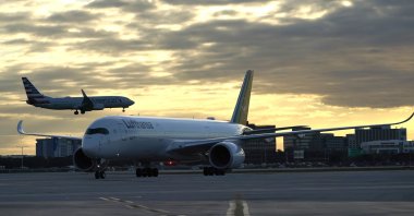 Airplanes are seen at Miami International Airport, Miami, U.S., Nov. 8, 2021. (AP Photo)