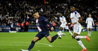 PSG's French forward Kylian Mbappe shoots the ball during the French L1 football match between Paris Saint-Germain FC and RC Strasbourg Alsace at the Parc des Princes stadium, Paris, France, Dec. 28, 2022. (AFP Photo)