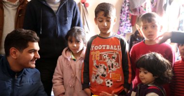 Volunteers deliver toys to Iraqi refugee children, in Eskişehir, central Türkiye, Jan. 21, 2019. (AA Photo) 