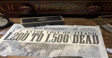 A newspaper with the headline decribing the tragedy is displayed at the &quot;Titanic: The Exhibition.&quot; (Photo by Funda Karayel)