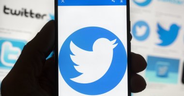 The Twitter logo is seen on a cell phone in Boston, U.S., Oct. 14, 2022. (AP Photo)